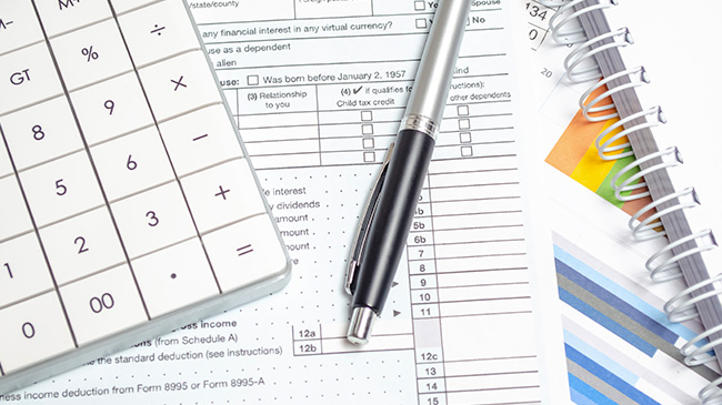 Picture of tax preparation software screen displaying tax forms and electronic filing options.