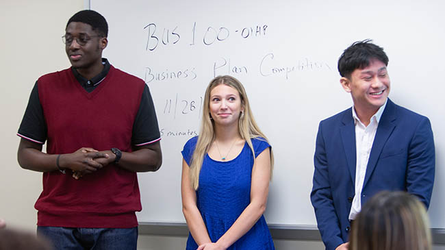 Two students giving a business presentation