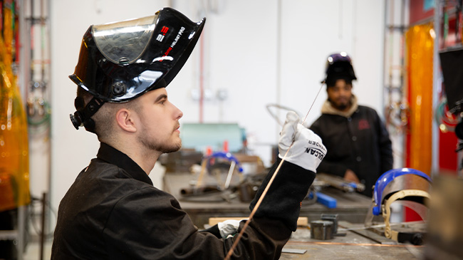 Two Reynolds' welding students